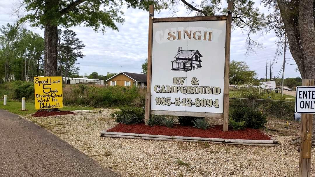 The Singh RV Campground roadside sign